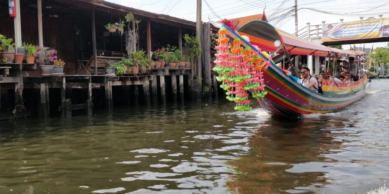 Colourful, traditional boat on a river in Thailand